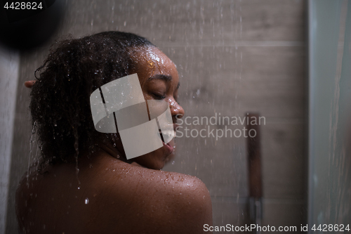 Image of African American woman in the shower