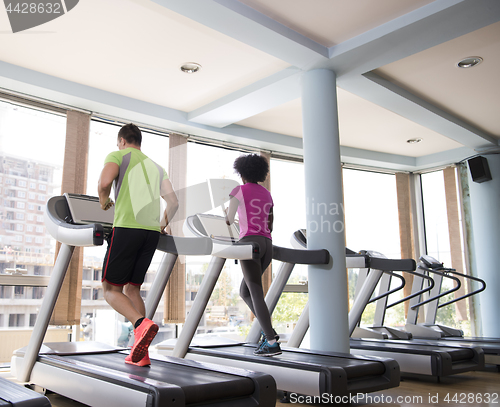 Image of people exercisinng a cardio on treadmill in gym