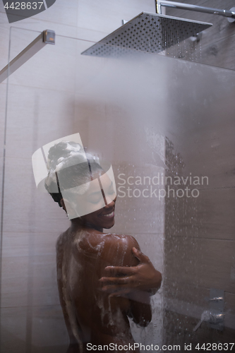 Image of African American woman in the shower