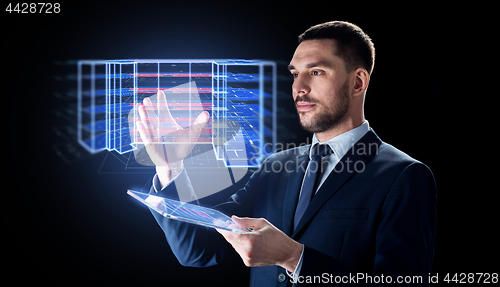 Image of man with tablet and virtual construction project