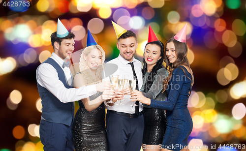 Image of friends with champagne glasses at birthday party