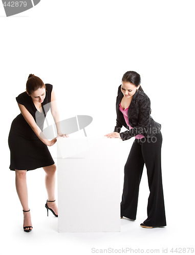 Image of Businesswomen with billboard