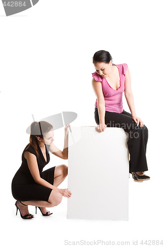 Image of Businesswomen and billboard