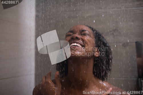 Image of African American woman in the shower