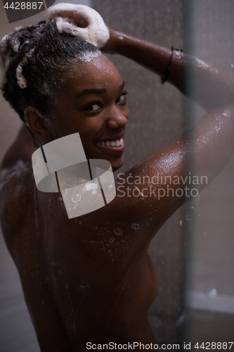 Image of African American woman in the shower