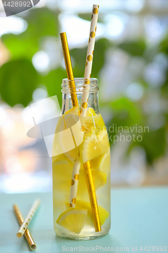 Image of Bottle of water and lemon