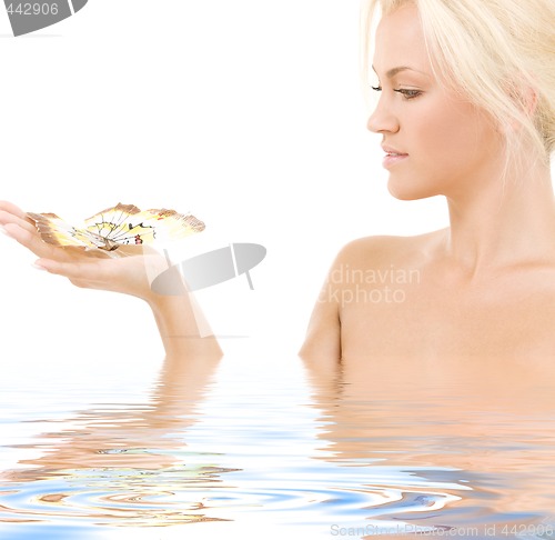 Image of lovely blonde with butterfly