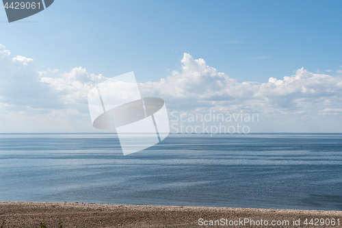 Image of Seascape with calm water by the coast