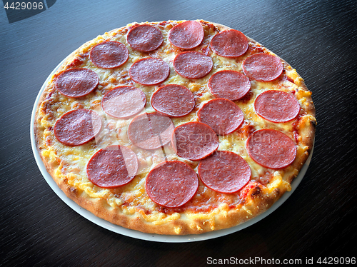 Image of freshly baked sausage pizza