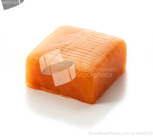 Image of caramel candy on white background