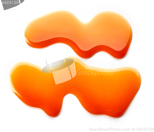 Image of caramel sauce on white background