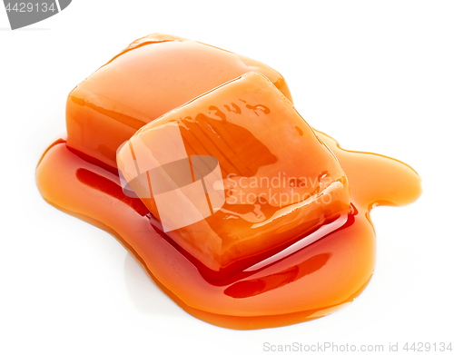 Image of two pieces of melted caramel