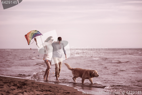 Image of happy couple enjoying time together at beach