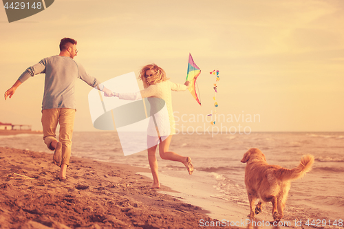 Image of happy couple enjoying time together at beach