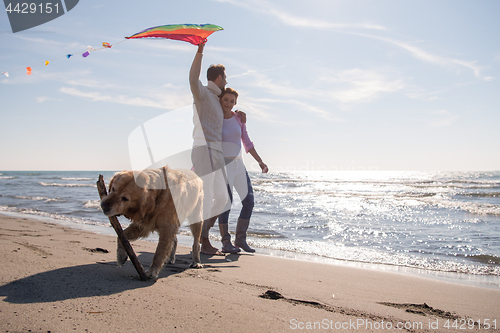 Image of happy couple enjoying time together at beach