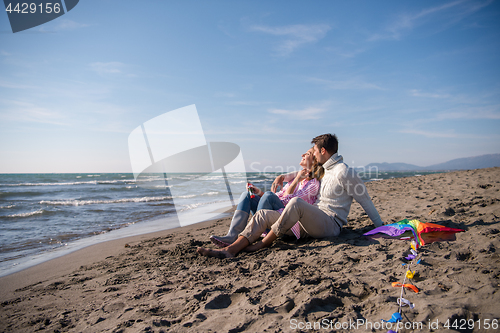 Image of young couple enjoying time together at beach