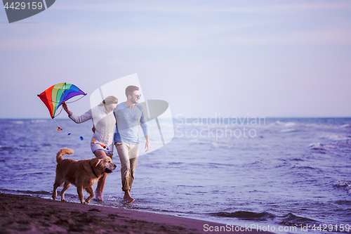 Image of happy couple enjoying time together at beach