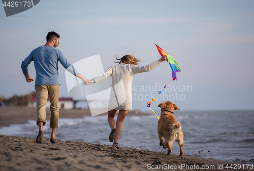 Image of happy couple enjoying time together at beach