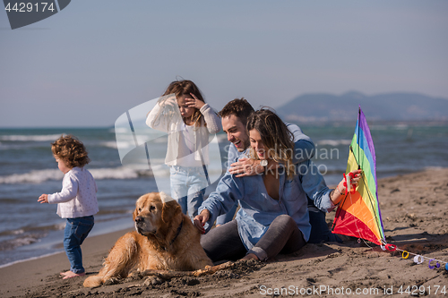 Image of happy young family enjoying vecation during autumn day