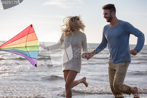 Image of Couple enjoying time together at beach