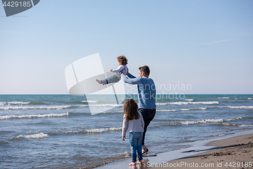 Image of Young family enjoying vecation during autumn