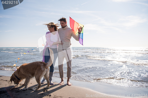 Image of happy couple enjoying time together at beach