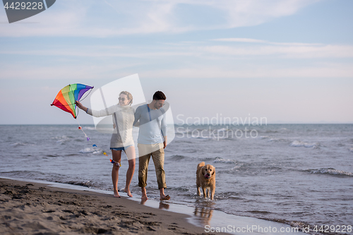 Image of happy couple enjoying time together at beach