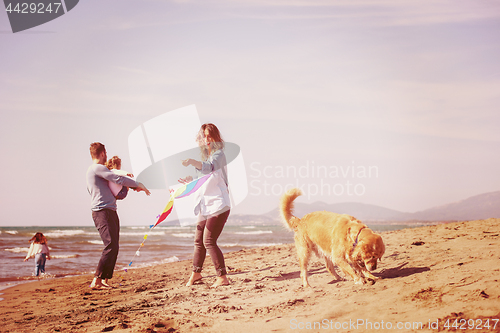 Image of happy young family enjoying vecation during autumn day