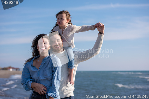 Image of Young family enjoying vecation during autumn