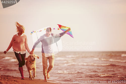 Image of happy couple enjoying time together at beach