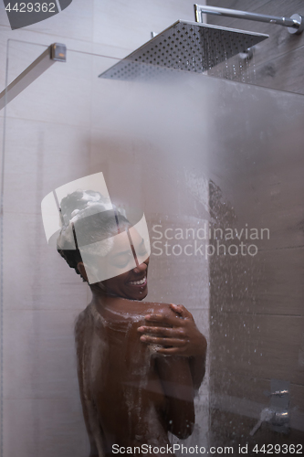 Image of African American woman in the shower