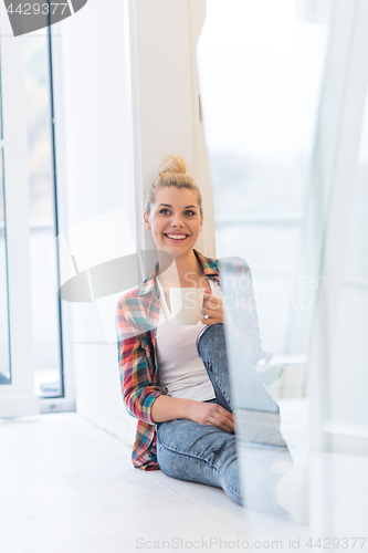 Image of Portrait of a beautiful girl on the floor