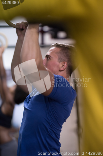 Image of man doing dipping exercise