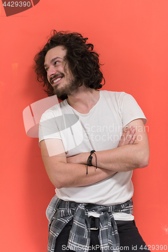 Image of young man with funny hair over color background