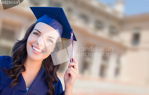 Image of Happy Graduating Mixed Race Woman In Cap and Gown Celebrating on