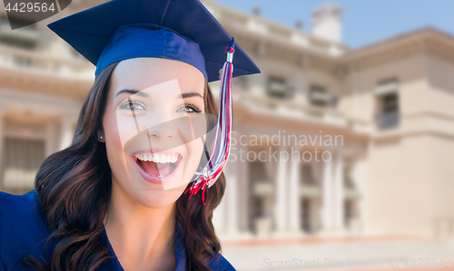 Image of Happy Graduating Mixed Race Woman In Cap and Gown Celebrating on