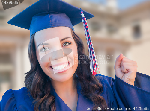 Image of Happy Graduating Mixed Race Woman In Cap and Gown Celebrating on