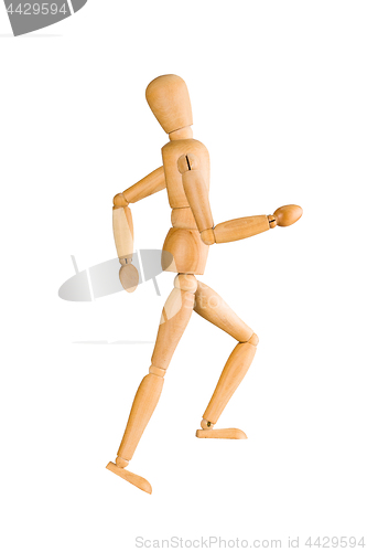 Image of Wooden mannequin running upstairs