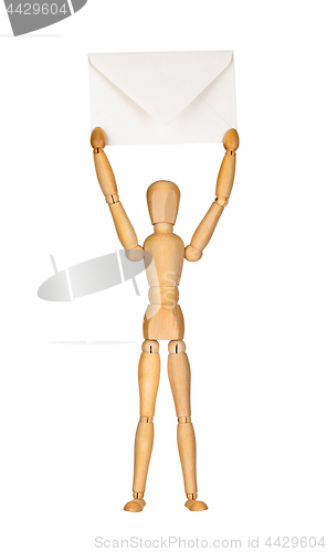 Image of Wooden model dummy holding envelop