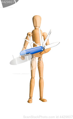 Image of Wooden mannequin holding swiss knife