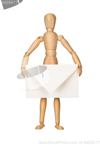 Image of Wooden model dummy holding envelop