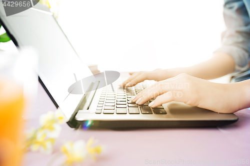 Image of Woman and fruit diet while working on computer in office