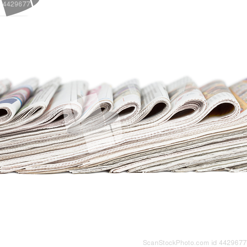 Image of Assortment of folded newspapers