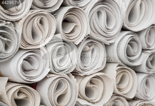 Image of Rolls of newspapers.