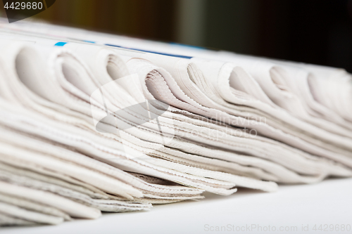 Image of Folded newspapers