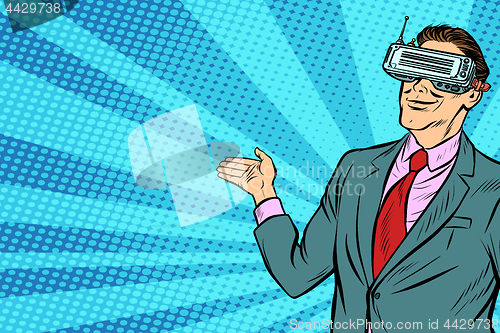 Image of pop art businessman in VR glasses presents