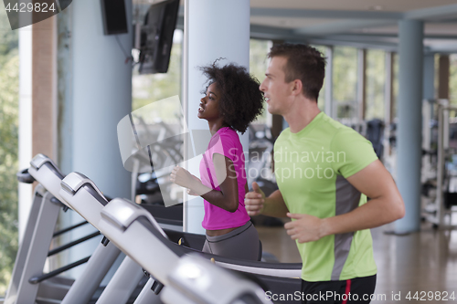 Image of people exercisinng a cardio on treadmill