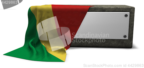 Image of stone socket and flag of the congo