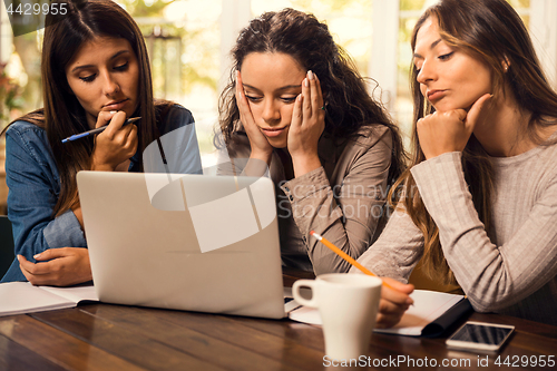 Image of Female friends worried with final exams