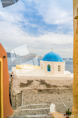 Image of Unique Santorini architecture, church with blue cupola